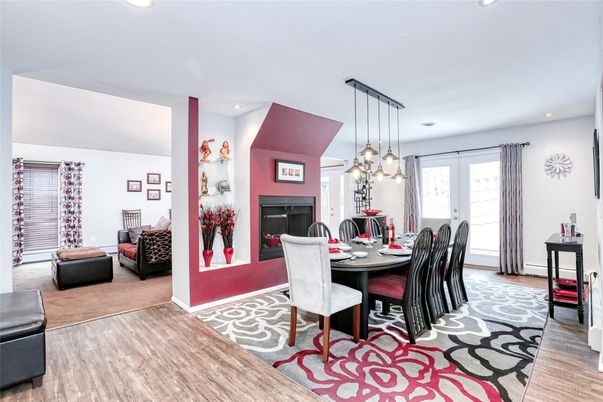 Dining room, Fireplace, Interior, Living room, Pendant Lights, Recessed Lighting, Wood Texture Flooring