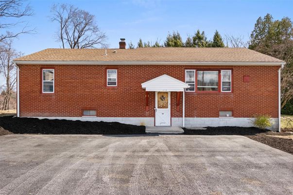 Exterior, Facade, Brick Facade, Cape Cod