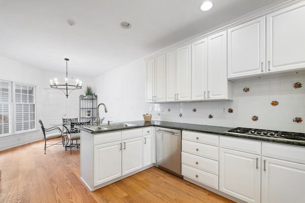 Chandelier, Dining room, Interior, Kitchen, Pendant Lights, Recessed Lighting, Stainless Steel Appliances, Wood Texture Flooring