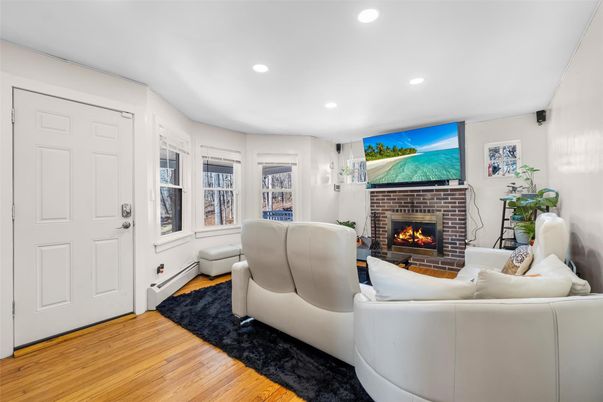 Fireplace, Interior, Living room, Recessed Lighting, Wood Texture Flooring
