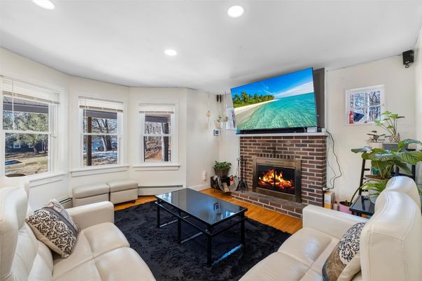Fireplace, Interior, Living room, Recessed Lighting, Wood Texture Flooring