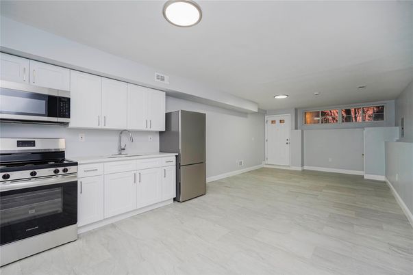 Interior, Kitchen, Marble, Recessed Lighting, Stainless Steel Appliances, Wood Texture Flooring