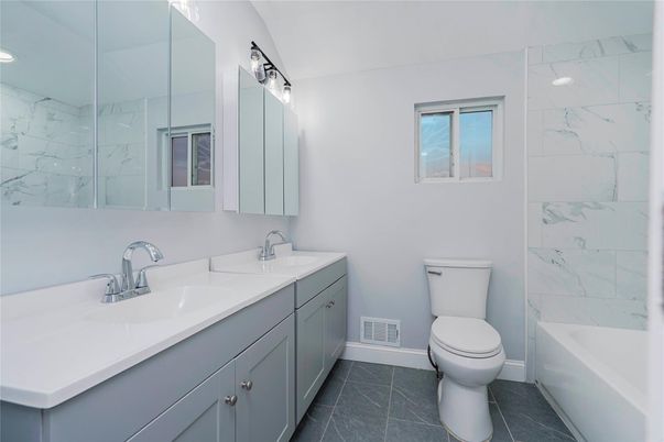 Bathroom, Dual Sink Vanities, Interior, Marble Walls, Recessed Lighting