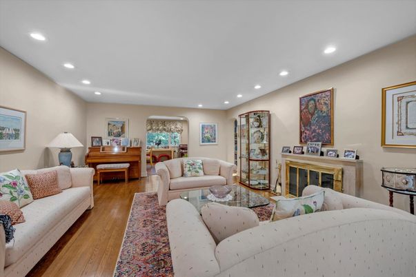 Fireplace, Interior, Living room, Piano, Recessed Lighting, Wood Texture Flooring