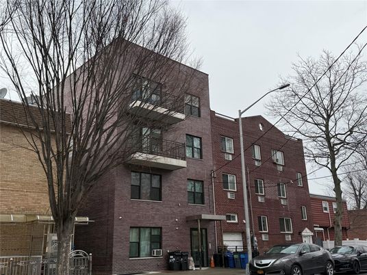 Exterior, Facade, Brick Facade, Condo Building
