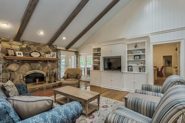 Fireplace, Interior, Living room, Recessed Lighting, Stone Walls, Wooden Beams, Wood Texture Flooring