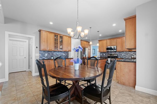 Chandelier, Dining room, Interior, Kitchen, Pendant Lights, Recessed Lighting, Stainless Steel Appliances