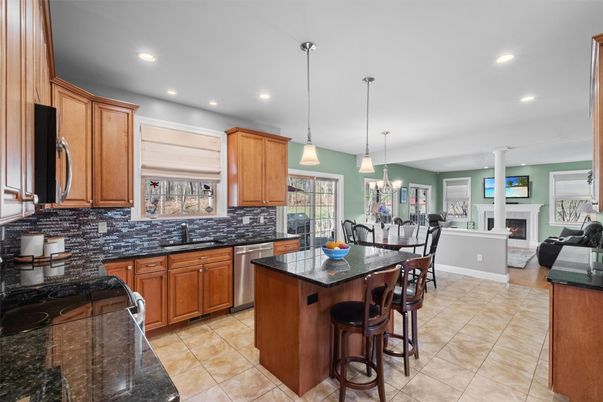 Dining room, Fireplace, Interior, Kitchen, Living room, Pendant Lights, Recessed Lighting, Stainless Steel Appliances