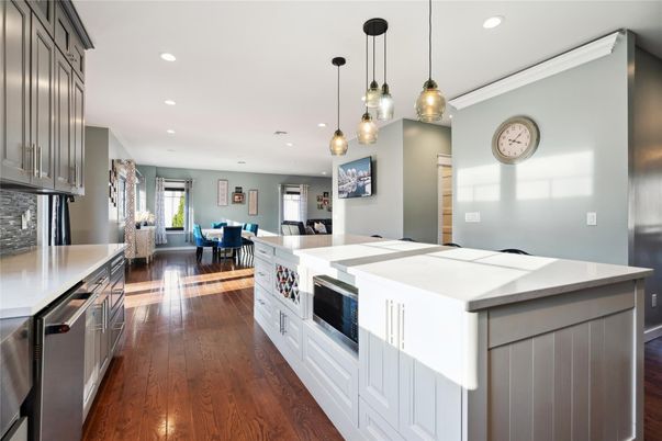 Dining room, Interior, Kitchen, Pendant Lights, Recessed Lighting, Stainless Steel Appliances, Wood Texture Flooring
