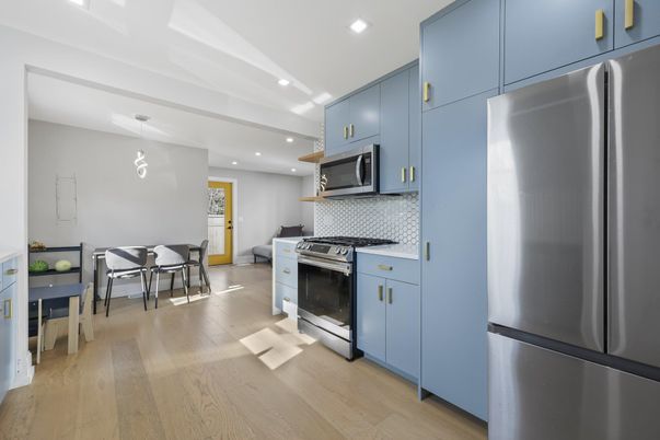 Dining room, Interior, Kitchen, Pendant Lights, Recessed Lighting, Stainless Steel Appliances, Wood Texture Flooring