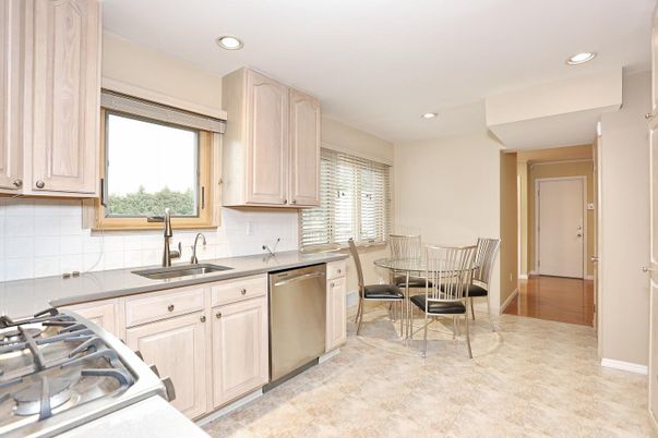 Dining room, Interior, Kitchen, Recessed Lighting, Stainless Steel Appliances, Wood Texture Flooring