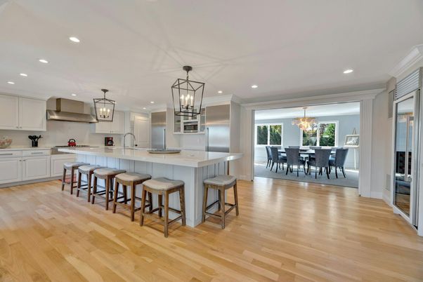 Chandelier, Dining room, Interior, Kitchen, Pendant Lights, Recessed Lighting, Stainless Steel Appliances, Wood Texture Flooring