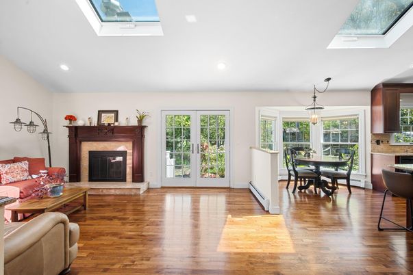 Dining room, Fireplace, Interior, Living room, Pendant Lights, Recessed Lighting, Wood Texture Flooring