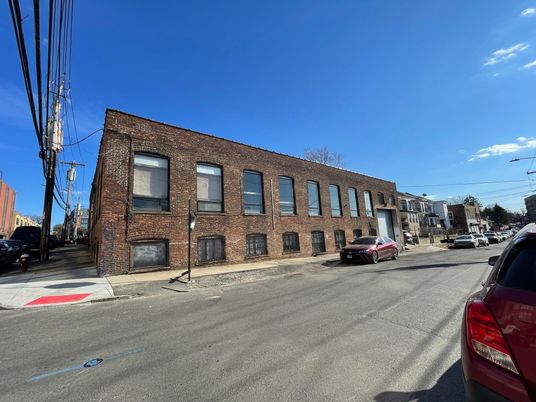 Exterior, Facade, Brick Facade, Condo Building