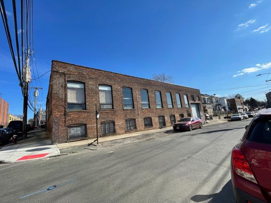Exterior, Facade, Brick Facade, Condo Building