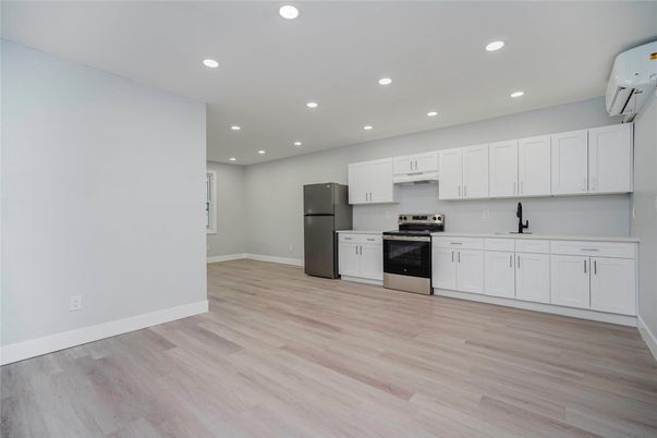Interior, Kitchen, Recessed Lighting, Stainless Steel Appliances, Wood Texture Flooring