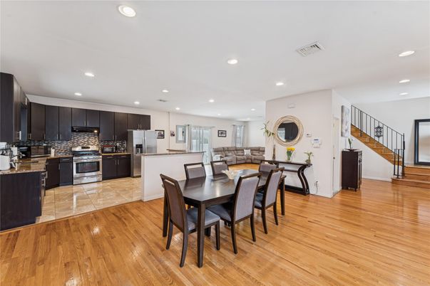 Dining room, Interior, Kitchen, Recessed Lighting, Stainless Steel Appliances, Wood Texture Flooring