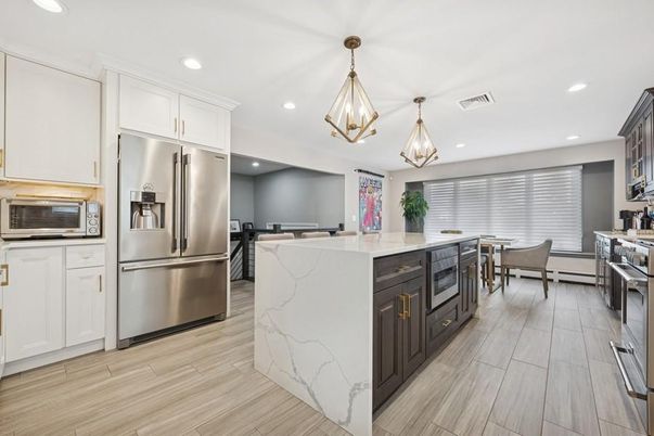 Dining room, Interior, Kitchen, Pendant Lights, Recessed Lighting, Stainless Steel Appliances, Wood Texture Flooring