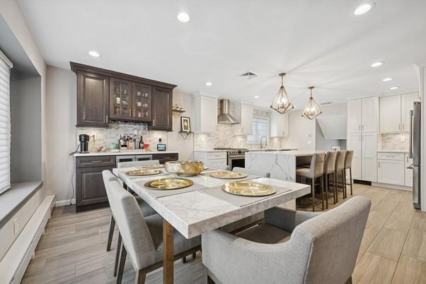Dining room, Interior, Kitchen, Pendant Lights, Recessed Lighting, Stainless Steel Appliances, Wood Texture Flooring