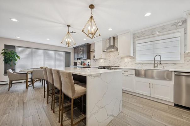 Dining room, Interior, Kitchen, Pendant Lights, Recessed Lighting, Stainless Steel Appliances, Wood Texture Flooring