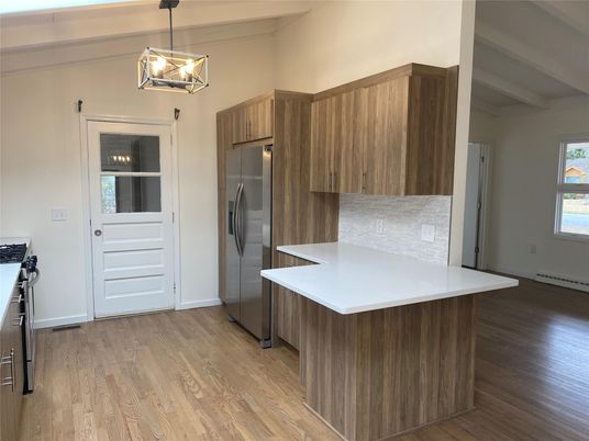 Interior, Kitchen, Pendant Lights, Stainless Steel Appliances, Wood Texture Flooring