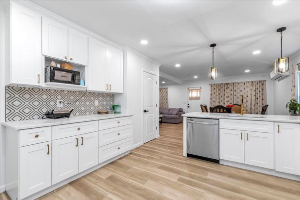 Interior, Kitchen, Pendant Lights, Recessed Lighting, Stainless Steel Appliances, Wood Texture Flooring