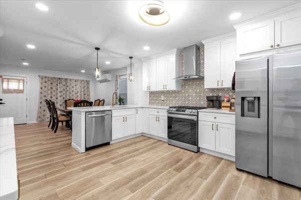 Dining room, Interior, Kitchen, Pendant Lights, Recessed Lighting, Stainless Steel Appliances, Wood Texture Flooring