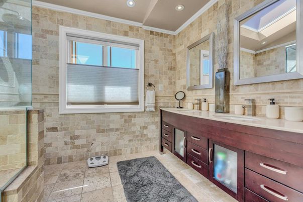 Bathroom, Dual Sink Vanities, Glass Shower, Interior, Recessed Lighting, Stone Walls