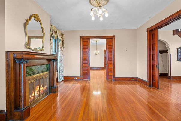 Chandelier, Empty room, Fireplace, Interior, Wood Texture Flooring