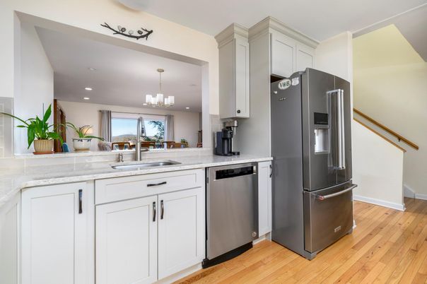 Chandelier, Interior, Kitchen, Recessed Lighting, Stainless Steel Appliances, Wood Texture Flooring