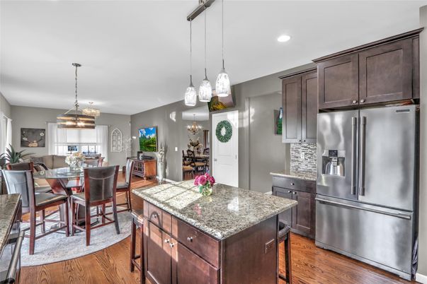 Dining room, Interior, Kitchen, Pendant Lights, Recessed Lighting, Stainless Steel Appliances, Wood Texture Flooring