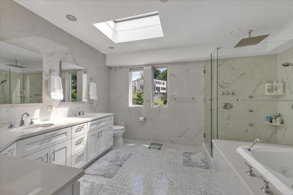 Bathroom, Dual Sink Vanities, Glass Shower, Interior, Marble Walls, Recessed Lighting