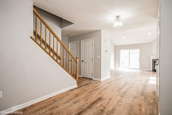 Empty room, Fireplace, Interior, Recessed Lighting, Wood Texture Flooring