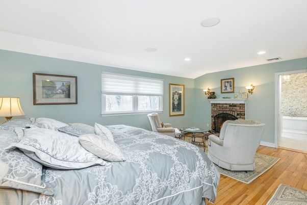 Bedroom, Fireplace, Interior, Recessed Lighting, Wood Texture Flooring
