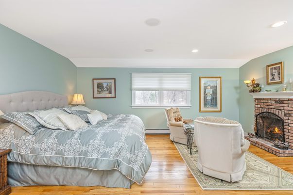 Bedroom, Fireplace, Interior, Recessed Lighting, Wood Texture Flooring