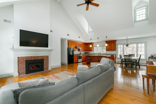 Dining room, Fireplace, Interior, Kitchen, Living room, Pendant Lights, Stainless Steel Appliances, Wood Texture Flooring