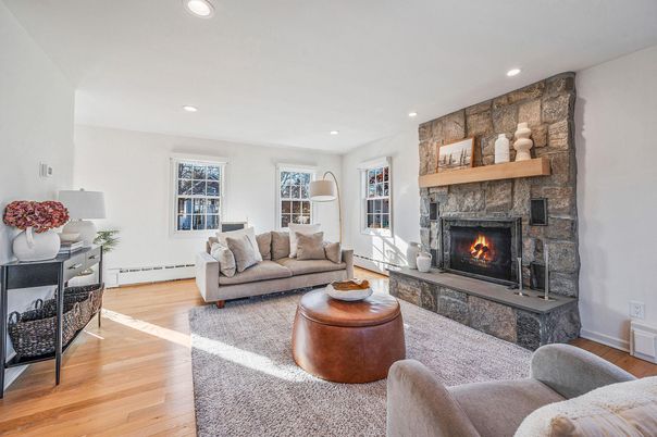 Fireplace, Interior, Living room, Recessed Lighting, Stone Walls, Wood Texture Flooring