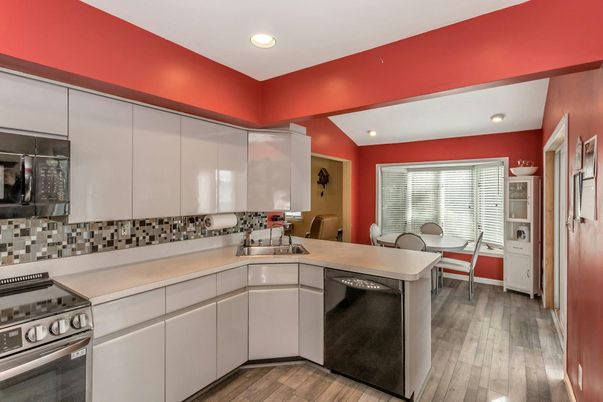 Dining room, Interior, Kitchen, Recessed Lighting, Stainless Steel Appliances, Wood Texture Flooring