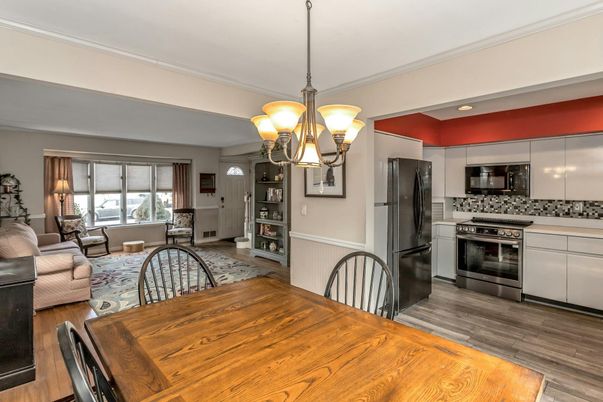 Chandelier, Dining room, Interior, Kitchen, Living room, Stainless Steel Appliances, Wood Texture Flooring