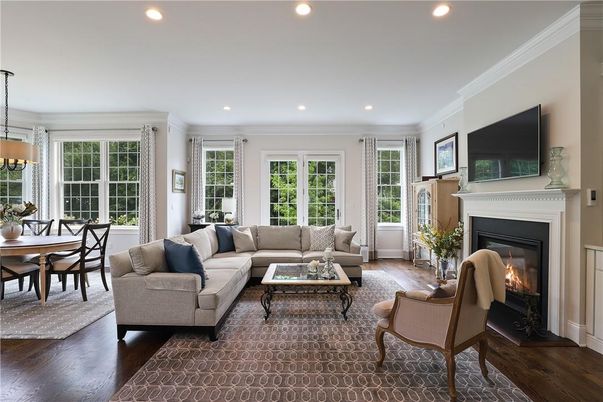 Dining room, Fireplace, Interior, Living room, Pendant Lights, Recessed Lighting, Wood Texture Flooring