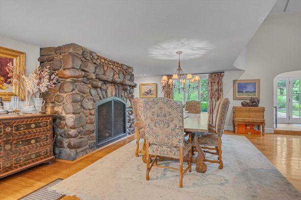 Chandelier, Dining room, Fireplace, Interior, Stone Walls, Wood Texture Flooring