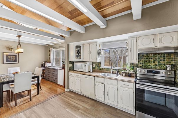 Dining room, Interior, Kitchen, Pendant Lights, Stainless Steel Appliances, Wooden Ceilings, Wood Texture Flooring