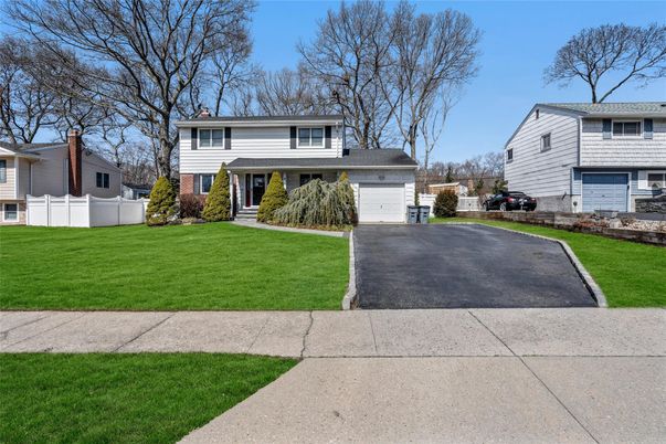 Attached, Exterior, Facade, Raised Ranch
