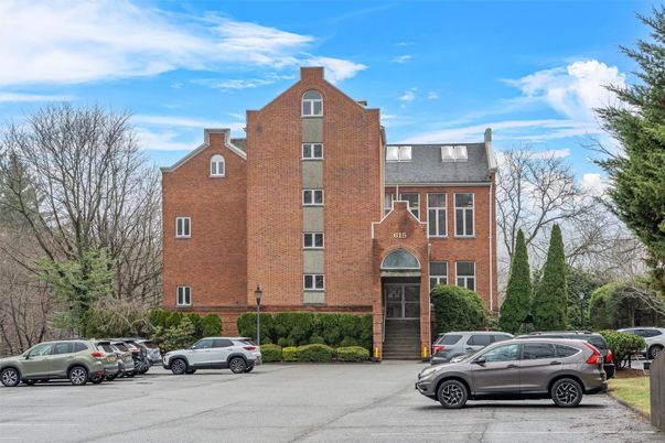Exterior, Facade, Brick Facade, Condo Building