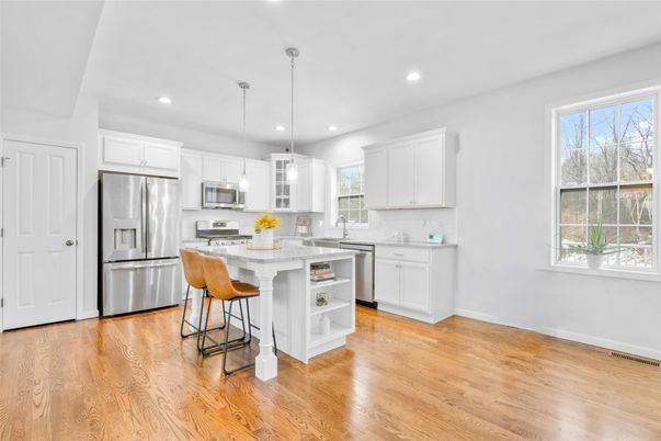 Interior, Kitchen, Pendant Lights, Recessed Lighting, Stainless Steel Appliances, Wood Texture Flooring