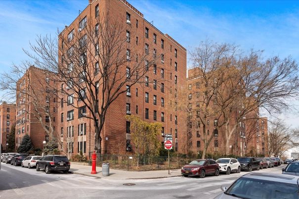 Exterior, Facade, Brick Facade, Condo Building