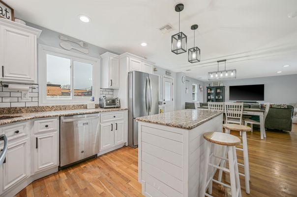 Dining room, Interior, Kitchen, Living room, Pendant Lights, Recessed Lighting, Stainless Steel Appliances, Wood Texture Flooring