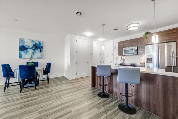 Dining room, Interior, Kitchen, Pendant Lights, Stainless Steel Appliances, Wood Texture Flooring