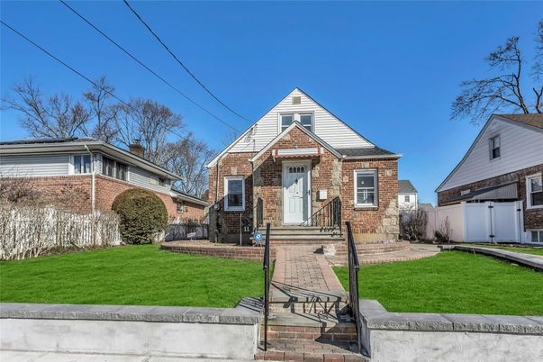 Exterior, Facade, Brick Facade, Cape Cod