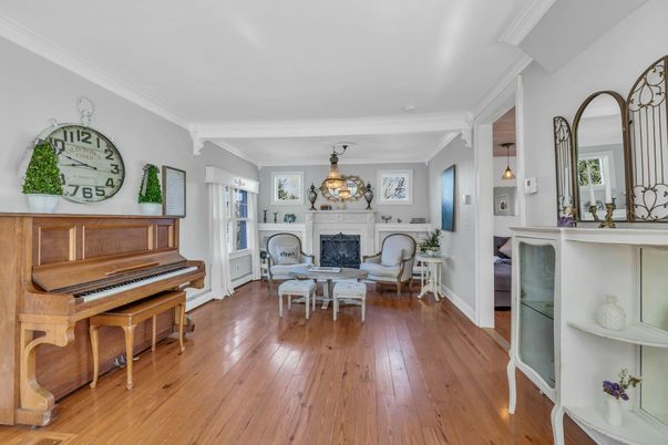Dining room, Fireplace, Interior, Pendant Lights, Piano, Wood Texture Flooring